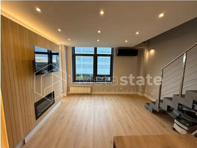 T1 novo a estrear com terraço e vista mar Parede