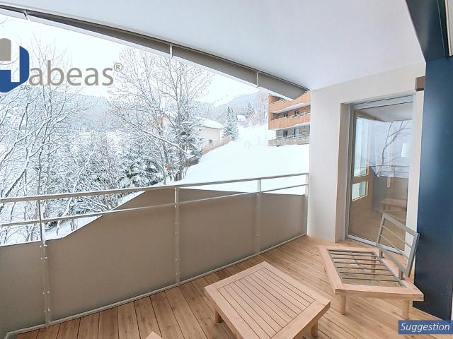 T2 avec 1 chambre et un Balcon de 16.31m², Un Casier à Ski, et un cellier