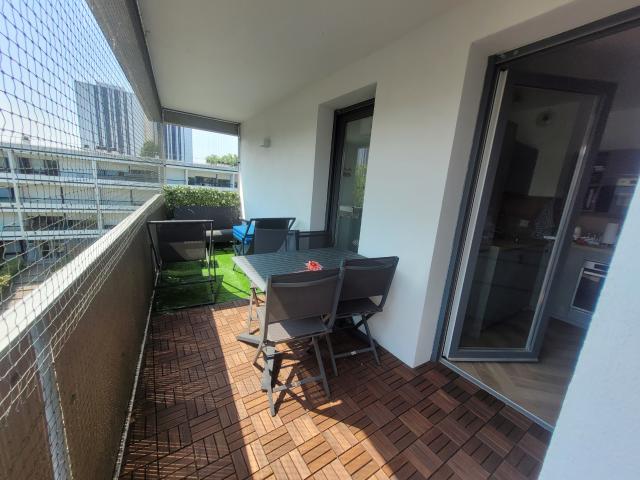 T4 DE 87 M2 AVEC TERRASSE ET 2 PLACES DE PARKING