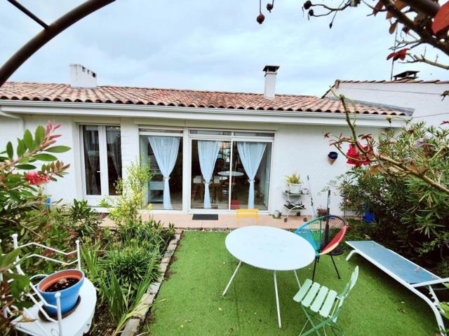 T4 lumineux au calme. Plain pied, garage