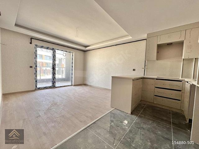 TAŞPINAR'da CADDE YAKINI ARA KAT LÜKS DAİREBESTOFİNCEK