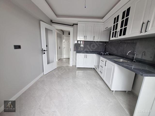 TAMAMINA KREDİLİKAPALI MUTFAKBULVARA YAKIN SATILIK 2+1 DAİRE
