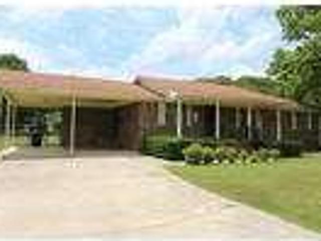 Take a One Level All Brick Home with a Large Backyard