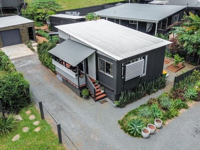 Tastefully Finished Island Retreat Elevated, Near New & Move In Ready! Veggie gardens fully established