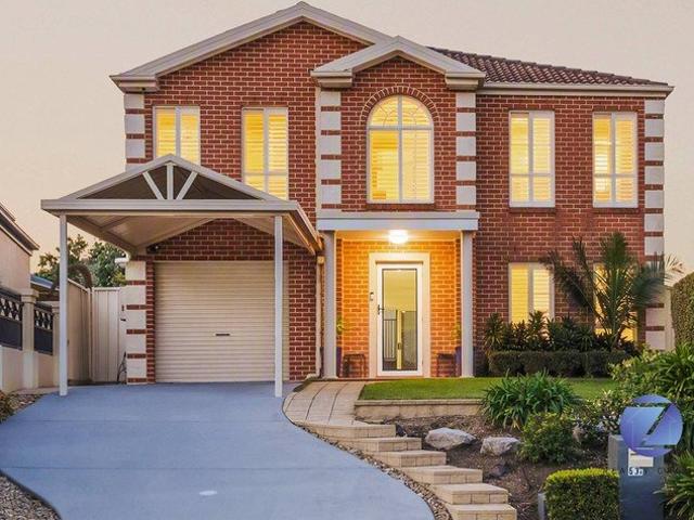 TASTEFULLY RENOVATED THROUGHOUT DISTRICT VIEWS !