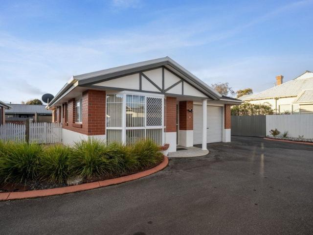 Tastefully renovated unit with extra parking