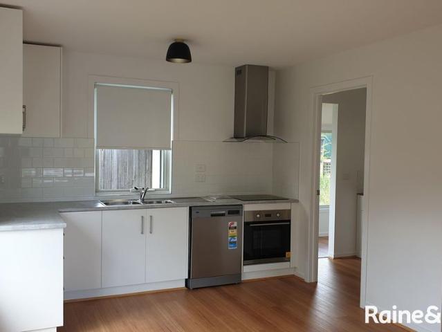 Tastefully renovated low maintenance!