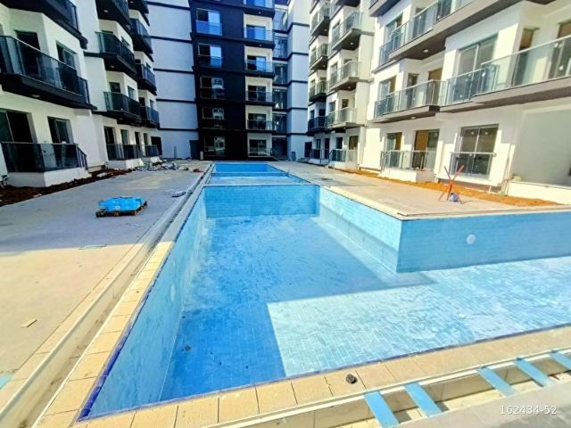 FİYAT DÜŞTÜ TATİL TADINDA HAVUZLU 2+1 BAHÇEKATI SATILIK DAİRE