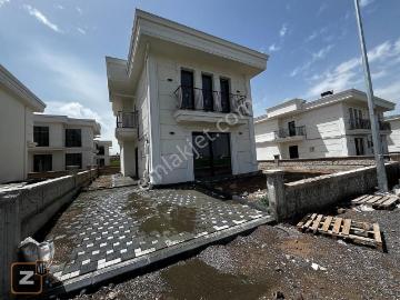 Tavlusun'da Bahçeyle İç İçe Modern Yaşam Villası