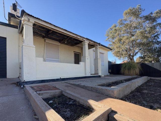 Tenanted Double Brick Home on Spacious Allotment