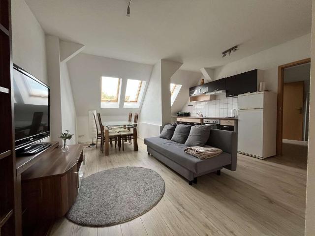 teilmöblierte DG Wohnung mit EBK