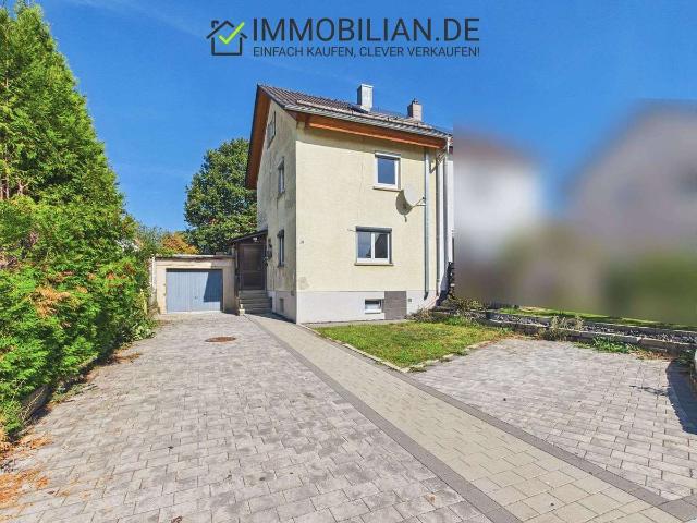 Teilsanierte Doppelhaushälfte mit Garten, Garage, Stellplatz und Solarthermie in ruhiger Lage