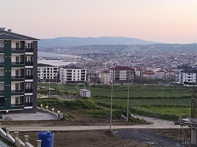 ATATÜRK MAHALLESİNDE MANZARALI VE OTOPARKLI 1+1 SATILIK DAİRE