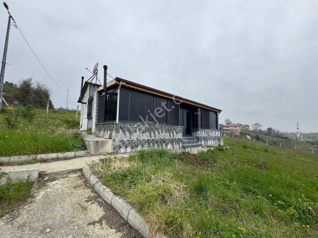 Tekkeköy De Satılık 1.234 M2 İmarlı Arsa İçinde Müstakil Yazlık Ev