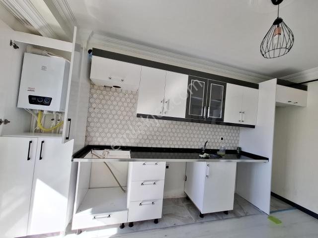 Tercih'den Kombili/iskanlı/okullar Bölgesinde Kiralık 2+1 Daire