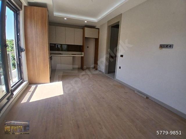 TERMESOS VE ASPENDOS BULVARLARI YAKINI SIFIR DAIRE ARA KATTA ASANSÖRLU 1+1