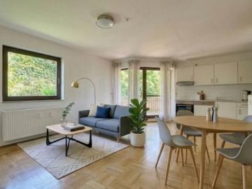 Terrasse, Einbauküche und Parkett: 2 Raum Whg. im Erdgeschoss