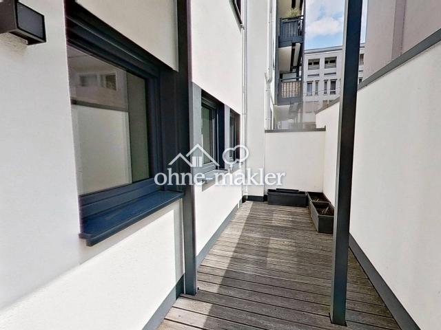 Terrasse inklusive: Großzügige 2 Zimmer Wohnung mit moderner Einbauküche