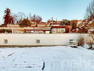 Terrassenwohnung auf zwei Ebenen mit Wintergarten und Panorama