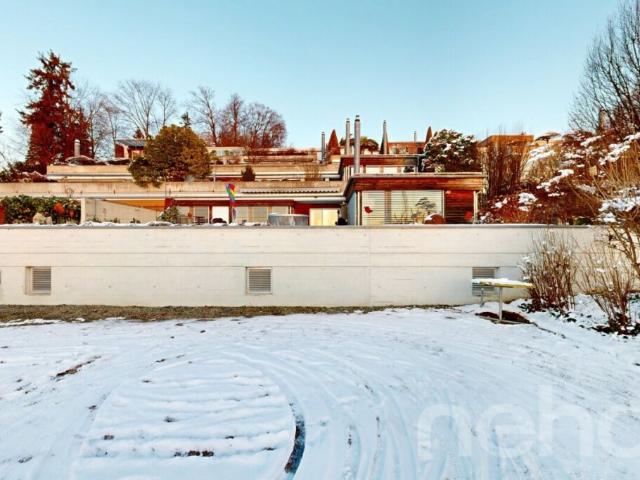 Terrassenwohnung auf zwei Ebenen mit Wintergarten und Panorama