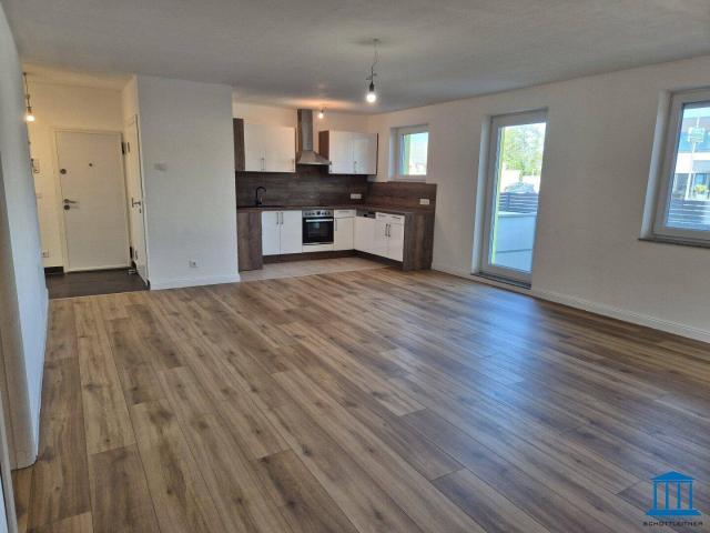 Terrassen Wohnung im Erdgeschoss mit Einbauküche und bis zu zwei PKW Abstellplätzen / Top 2