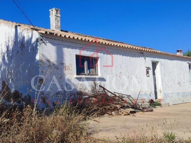 Terreno misto com casa