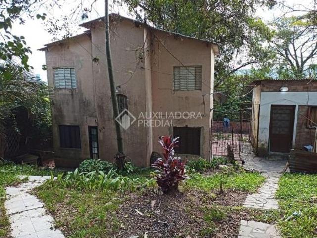 Terreno à venda, com casa redisdencial, 2 dormitórios