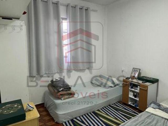 Terreno amplo com 320 m² de área construída 2 casas 3 vagas de garagem