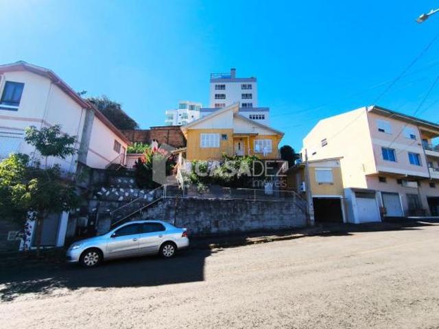 TERRENO COM 4 MORADIAS