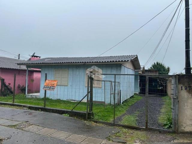 Terreno com 4 casas alugadas no bairro Alvorada