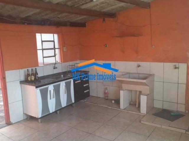 Terreno com 4 casas já alugadas e 1 Salão. Bom para renda!
