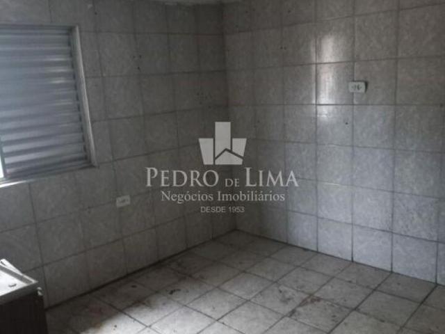 Terreno com 4 casas para renda na Ponte Rasa