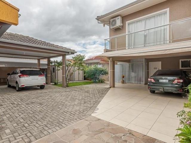 Terreno com 522 m² com Duas Casas no Fanny ideal para Morar e Investir