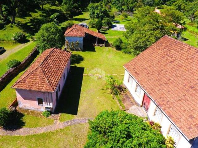 Terreno com 5 casas no Morro Reuter RS