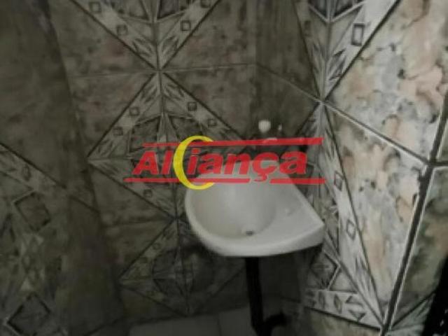 Terreno com 5 casas e salão comercial | 321 m² | Excelente oportunidade para investidores
