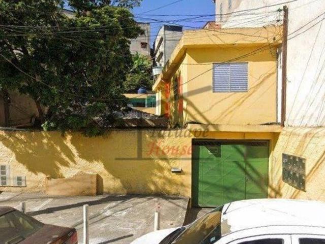 Terreno com 5 casas para renda Interlagos