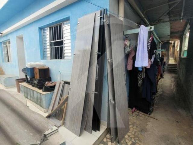 Terreno com 8 casas e um salão comercial à venda no Mandaqui de 525m2 com 2 vagas