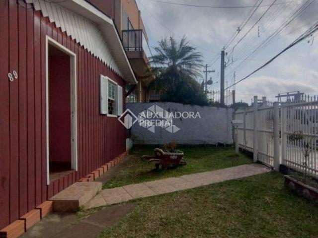 TERRENO COM 02 CASAS MV1