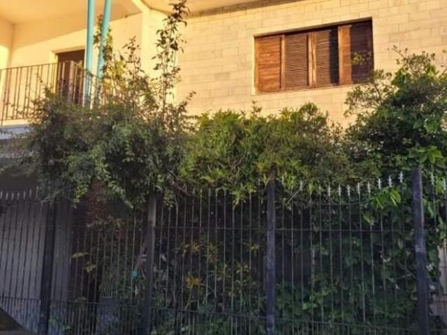 TERRENO COM 02 CASAS NA VILA EMA