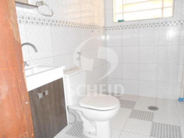 Terreno com 04 moradias, sendo 02 com 1 dorm e 02 com 02 dorms