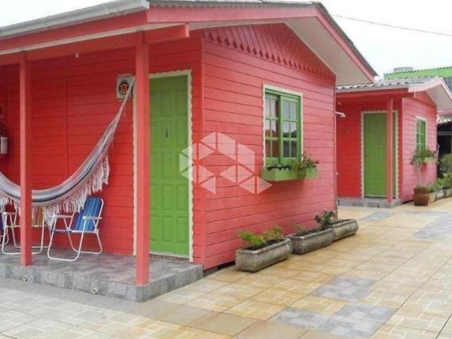 Terreno com 11,70x26m2 de fundos com Restaurante e Pousada em funcionamento