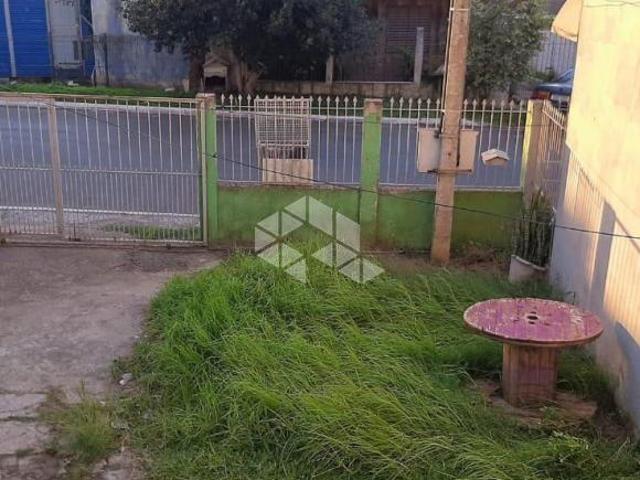 Terreno com 2 casas Bairro Olaria