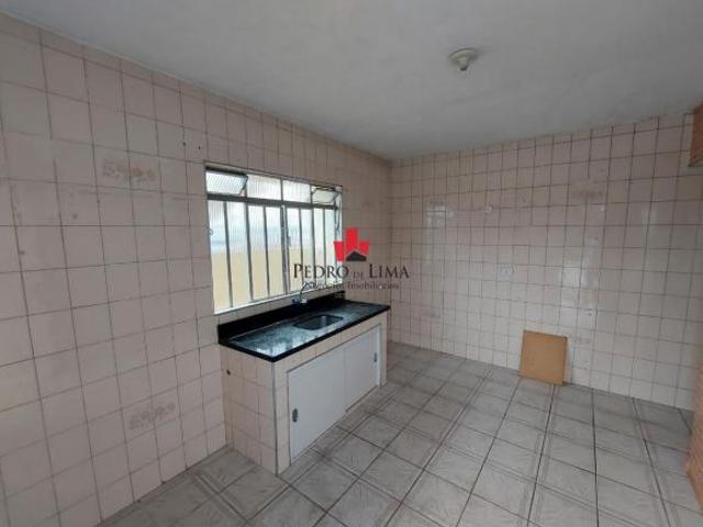 Terreno com 2 casas e 1 Vaga no Cangaiba