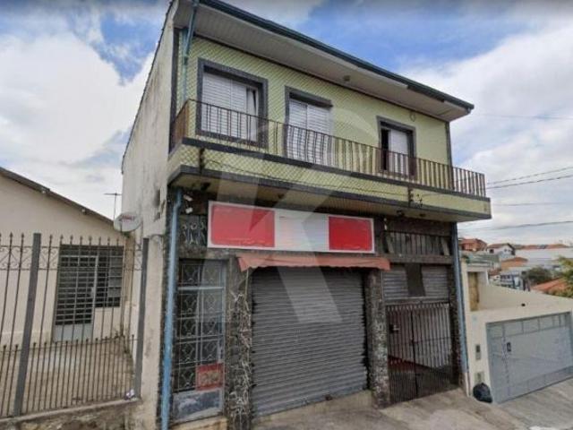 Terreno com 2 casas e 1 salão com 208m2 na Vila Gustavo