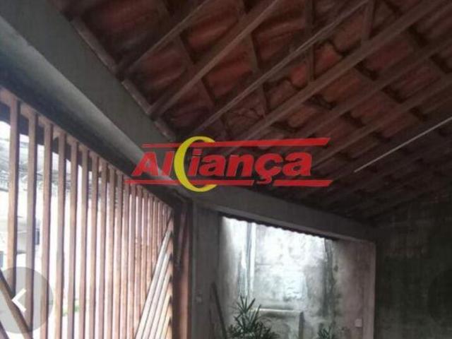 Terreno com 2 casas e lazer