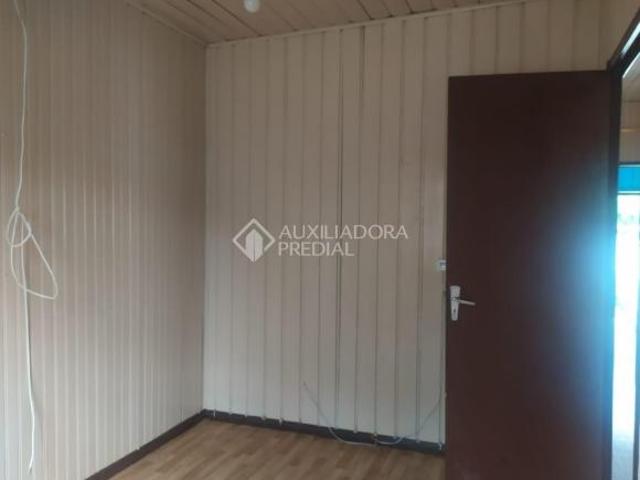Terreno com 2 casas