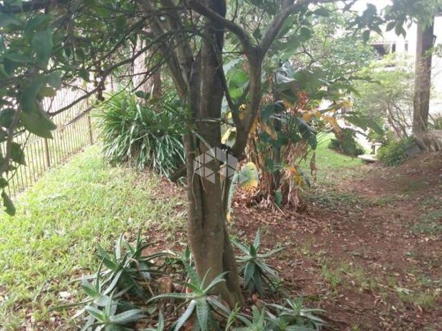 Terreno com 360m2 de área útil no loteamento Jardim Stella Maris em Alvorada /RS