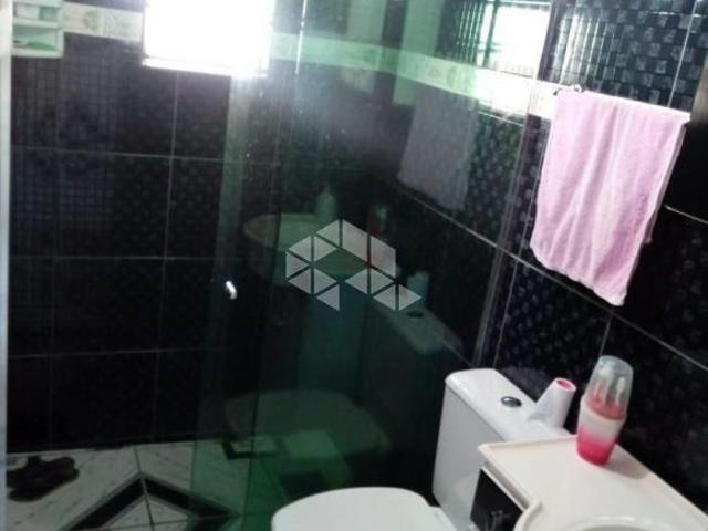 Terreno com 3 casas à venda no bairro Mathias Velho