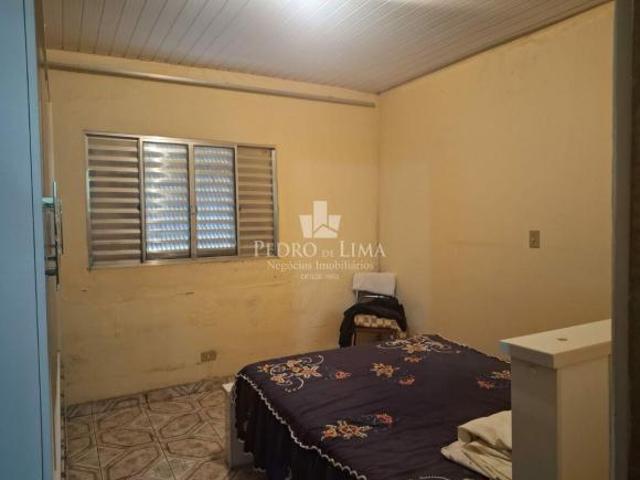 Terreno com 3 casas antigas no Cangaíba, ideal para construtores