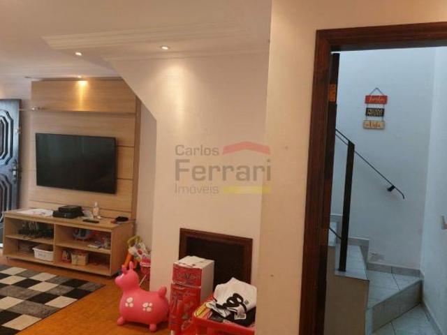 Terreno com 3 casas em Santana